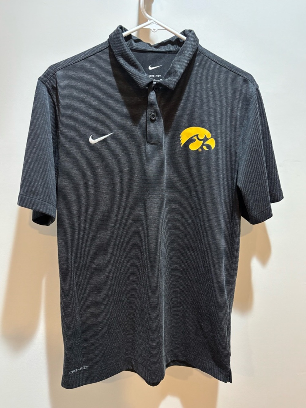 Nike Men’s Black Polo with Yellow Iowa Hawkeyes Logo